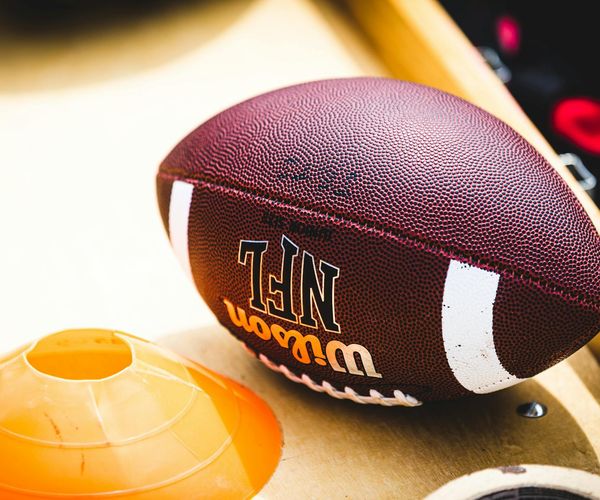 Close up of sports equipment and a person preparing for exercise