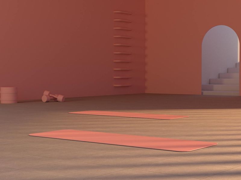 Spacious minimalist studio with natural light and exercise mats